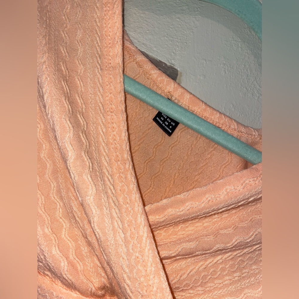 coral long sleeve pattern top